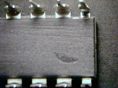 A grey part is visible with part of an indent. Also horizontal lines are visible near the top.